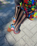 Close-up of brown/black patent woven heel, Kron by Kronkron Burgundy heels