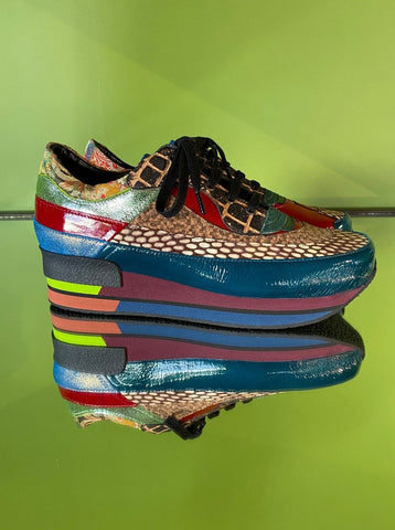 Multicolored women's sneaker from Kron by Kronkron featuring a vibrant mix of colors and patterns, ideal for adding a stylish flair to your outfit