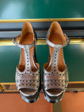 Chie Mihara KINTA heels viewed from above in silver-effect leather with green accents, T-bar strap and buckle closure