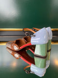 Chie Mihara VYCOLA Silver Multi heels shown from the rear angle with a powder blue back panel, sage green block heel and black ankle strap