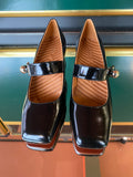 Chie Mihara VYKAR Black heels viewed from above in glossy black leather with a slim Mary Jane strap and elegant silhouette