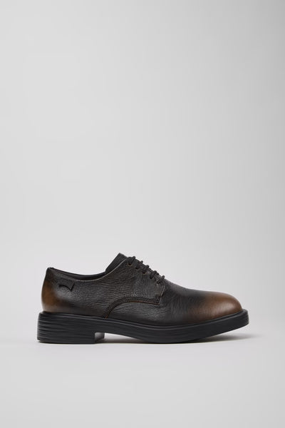 Side view of Dean multicolor black and brown leather men’s shoes on a white background