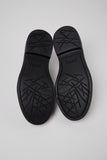 Bottom view of Dean multicolor men’s shoes showing EXTRALIGHT outsole pattern on a white background