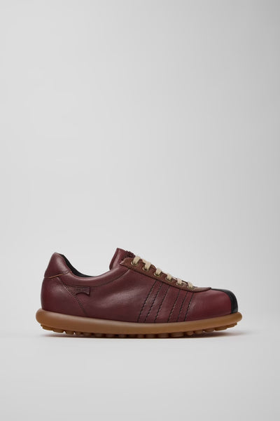 Side view of Pelotas multicolor calfskin leather men’s shoes on a white background.
