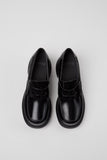 Top view of Camper Thelma II black leather moccasin on a plain background.