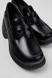 Close-up of Camper Thelma II black calfskin leather upper showing stitching and platform construction