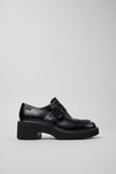 Side view of Camper Milah black calfskin leather shoes from Kron showing the chunky sculptural profile and lightweight EVA sole.