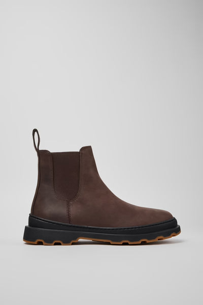 Side view of brown nubuck ankle boots with chunky outsole and modern profile on a white background