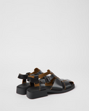 Rear angled
Camper Dana black leather sandals for women shown from the rear angle with slingback straps and lightweight sole