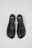 Top view of Kora black semi-open leather shoes with slip on