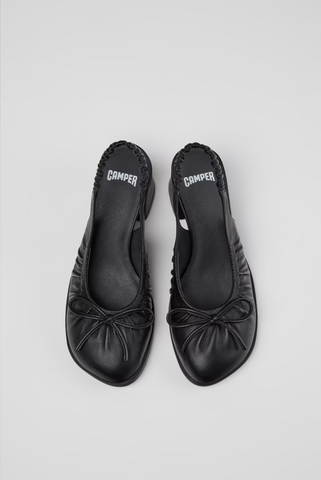 Top view of Kora black semi-open leather shoes with slip on