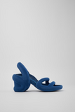 Side view of Kobarah blue sandal with sculptural high heel