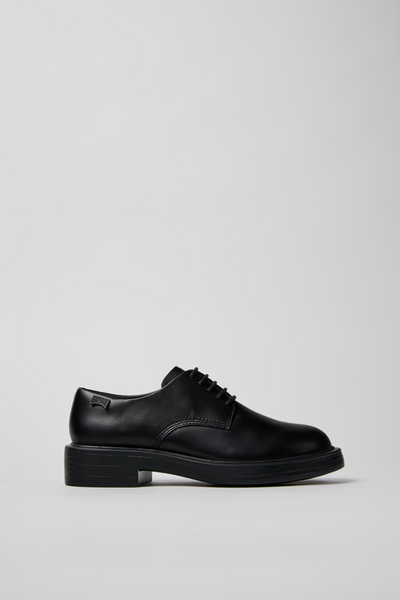 Side view of Dean black leather shoe with lightweight EVA outsole