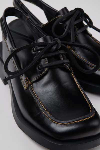 Donna black semi-open leather shoes with lace-up front and square toe