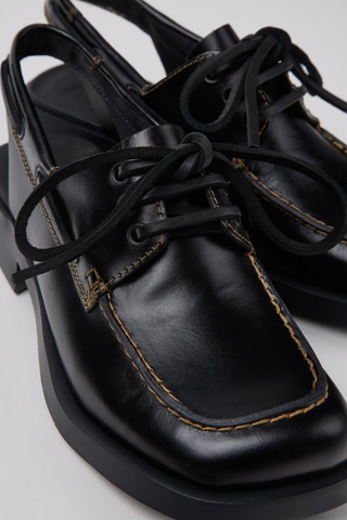 Donna black semi-open leather shoes with lace-up front and square toe