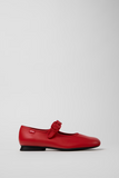 Side view of Casi Myra red leather ballerina with Mary Jane strap
