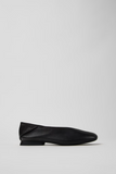 Side view of Casi Myra black leather ballerina with low heel