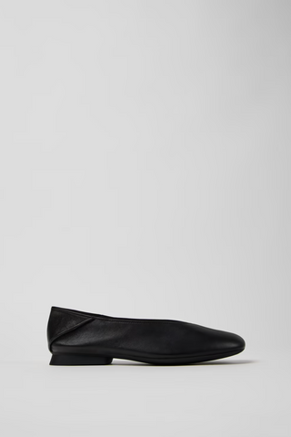 Side view of Casi Myra black leather ballerina with low heel