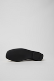 Outsole detail of Casi Myra black leather ballerina with black TPU sole