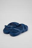 Back view of Camper Kobarah Flat blue sandals with rounded strap design