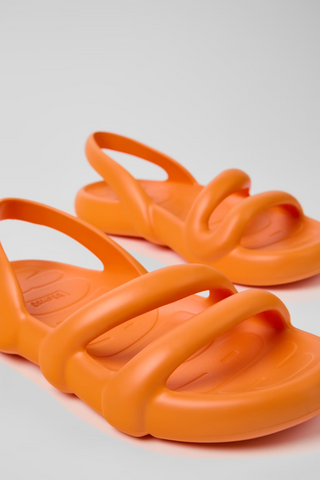 Close-up of Camper Kobarah Flat orange EVA sandals with sculptural straps