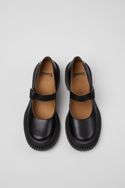 Top view of Camper Pix London black leather heeled moccasins with buckle straps.