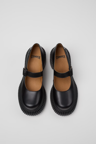 Top view of Camper Pix London black leather heeled moccasins with buckle straps.