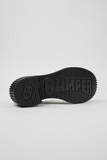 Sole view of Camper Pix London black XL EXTRALIGHT® EVA outsole with raised Camper logo.