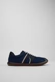 Side view of a blue Camper Pelotas Soller sneaker with textile upper, cream accents and brown rubber outsole.