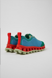 Camper x SUNNEI PELOTISSIMA sneakers rear angle showing red heel pulls, blue knit upper and double-studded sole