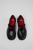 Top view of Camper Alaro black leather moccasins showing the toe shape and slip-on opening