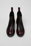 Top view of Camper Dean black and burgundy leather ankle boots showing the opening and upper shape