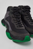 Close-up of Camper Karst 2 black textile and nubuck sneakers showing the layered upper, laces and contrasting materials
