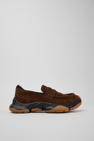 Side view of Camper Karst 2 brown suede moccasins showing the sculptural black and tan rubber sole