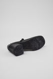 Outsole view of Camper Kora black leather Mary Jane shoes showing the sole design