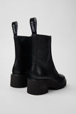 Top view of Camper Milah black leather ankle boots showing the opening and rounded toe shape