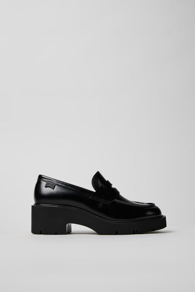 Side view of Camper Milah black leather moccasins showing the substantial sole and chunky silhouette