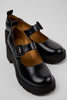 Close-up of Camper Milah black leather shoes showing the upper and design details