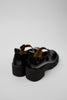Rear view of Camper Milah black leather shoes showing the heel and sole profile