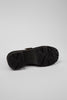 Outsole view of Camper Milah black leather shoes showing the sole pattern