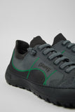 Close-up of Camper Peu Serra grey textile sneakers showing the textured upper, elastic laces and stitching