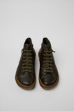 Top view of Camper Peu Serra green leather ankle boots showing the rounded toes and elastic lace design