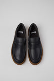 Top view of Camper Peu Terreno men's black leather moccasins showing the rounded toes and slip-on design