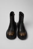 Top view of Camper Pix Berlin men's black and brown leather ankle boots showing the rounded toe and upper design
