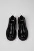 Top view of Camper Pix Berlin black leather loafers with broad straps across the instep