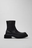 Side view of Camper Pix Berlin black nubuck ankle boots showing the sculptural sole and ankle-high silhouette
