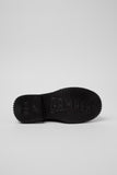 Underside of Camper Pix Berlin black nubuck ankle boots showing the outsole pattern