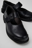 Close-up of Camper Pix black leather ballerinas showing the rounded toe, leather upper and strap detailing