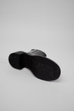 Outsole of Camper Pix London black leather ankle boots showing the tread and sole design

 Afrita allt