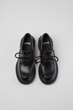Top view of Camper Pix London black leather heeled loafers showing the toe shape and upper design